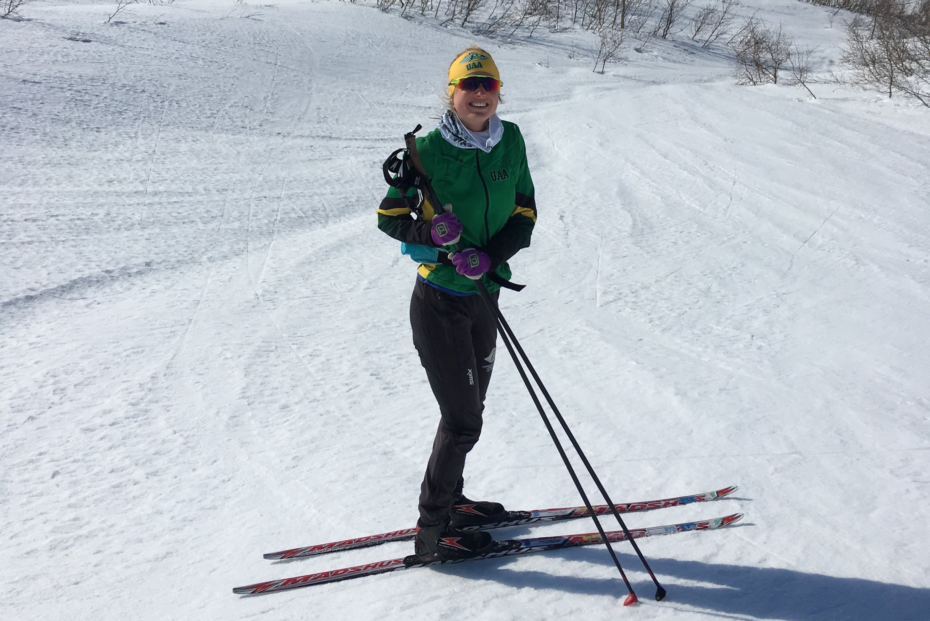 A UAA Nordic skier competing on a snowy course